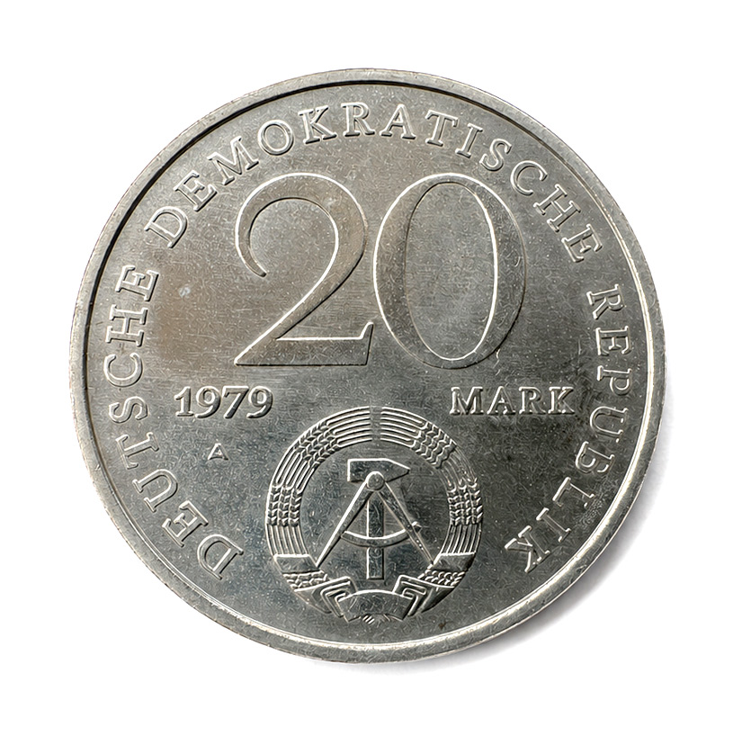 East German 20-Mark coin (1979) with hammer-and-compass emblem and DEUTSCHE DEMOKRATISCHE REPUBLIK inscription