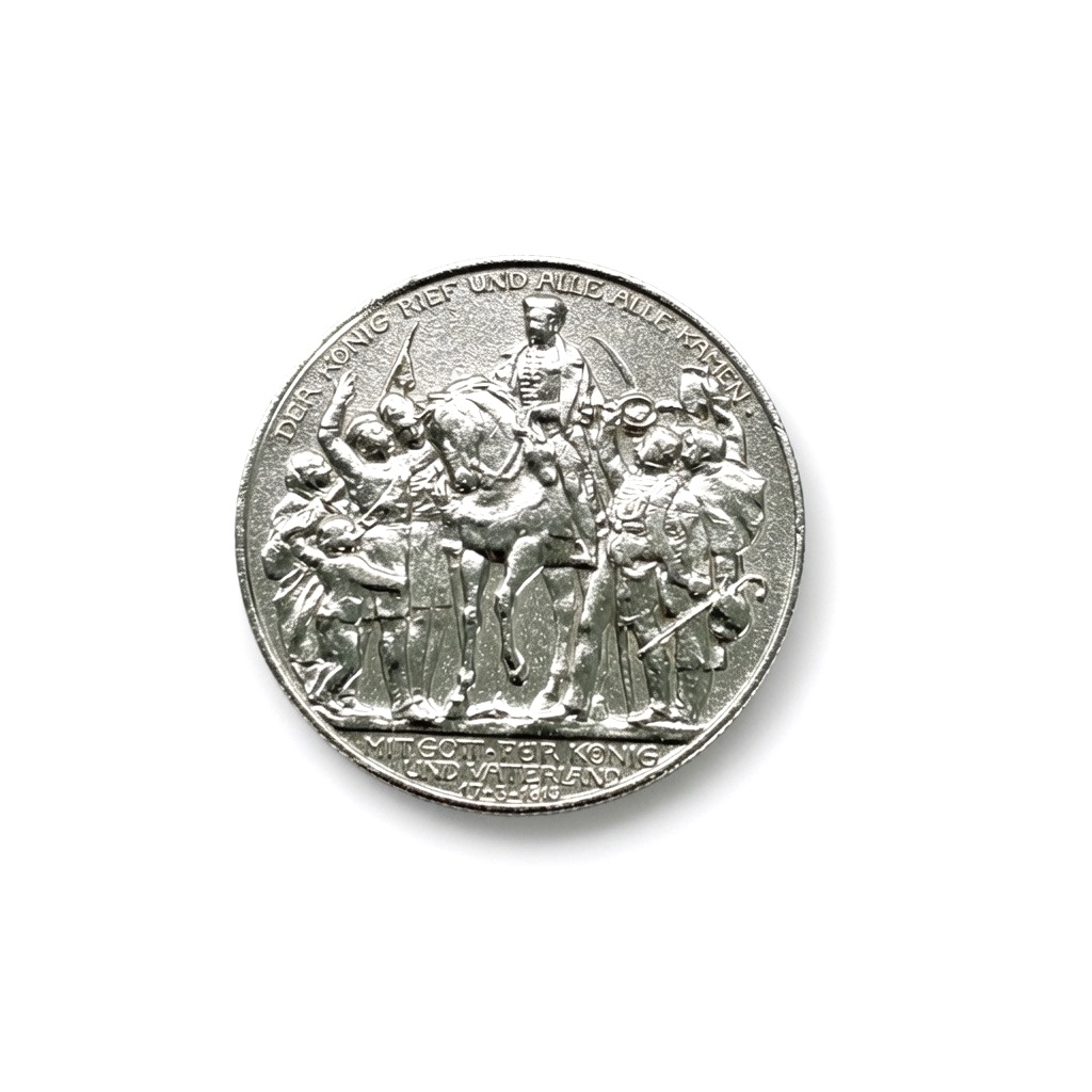 Silver coin showing a mounted leader surrounded by marching soldiers and civilians, a historic procession scene on a circular coin edge, with inscriptions along the rim.