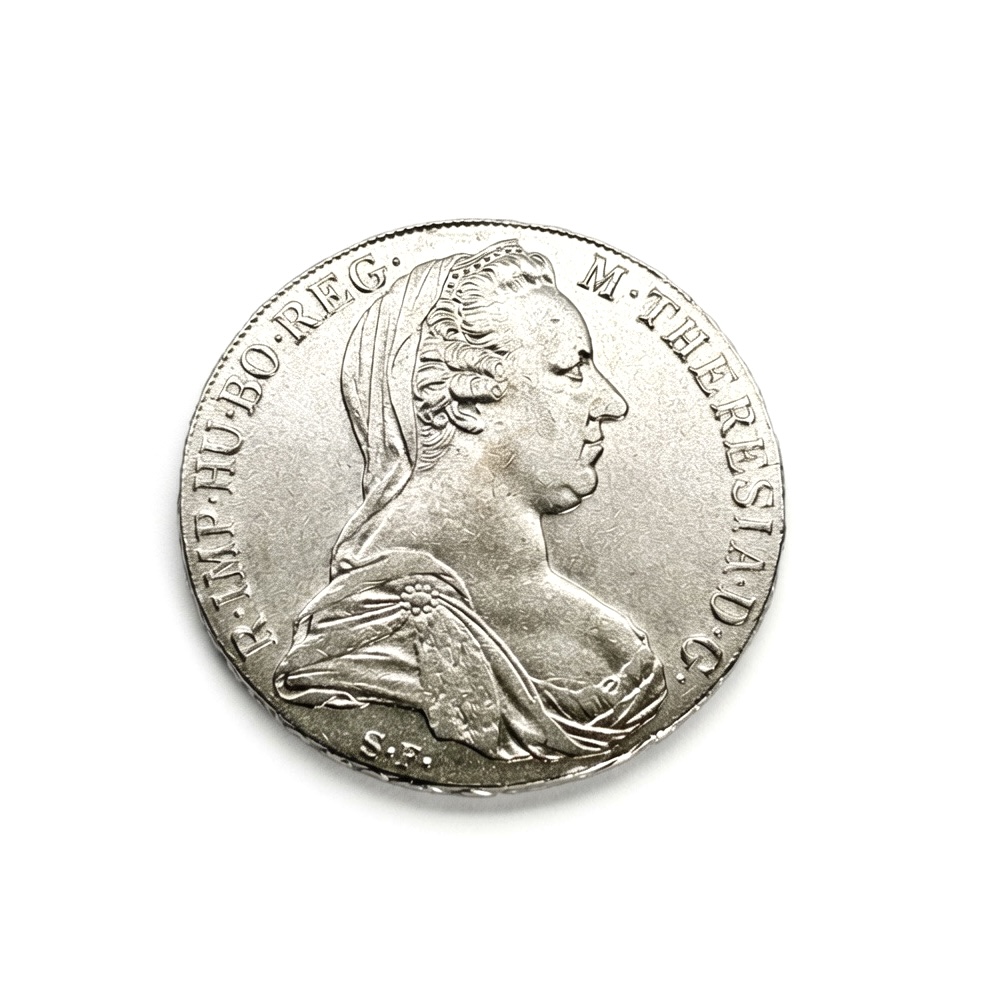 Profile portrait of a woman in a classical dress on a silver coin, with Latin inscriptions along the edge and a small 'S.F.' mint mark at the bottom center image area